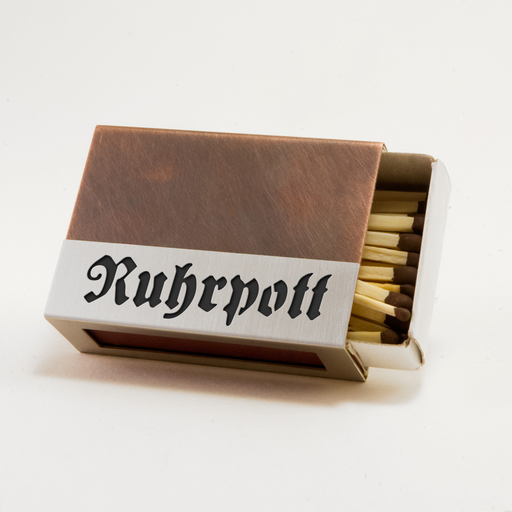 Streichholzschachtel - Huelle "Ruhrpott" aus Edelstahl und Kupfer mit schwarzer Schrift